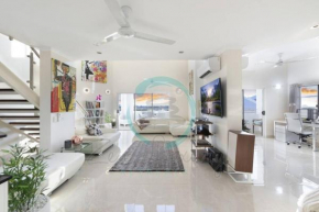 Zen Cascade: 4BR Luxury Penthouse Loft with Views